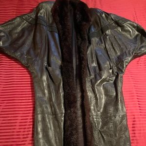 Vintage leather coat, 48” long, arm length 22”, 19” across back.